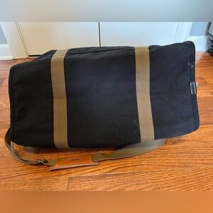 Dakota Tumi Black Canvas Duffel Travel Bag